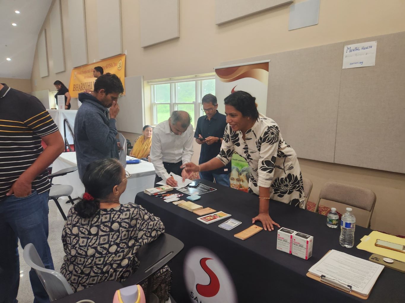 SAMHIN volunteers doing mental health screening at community event