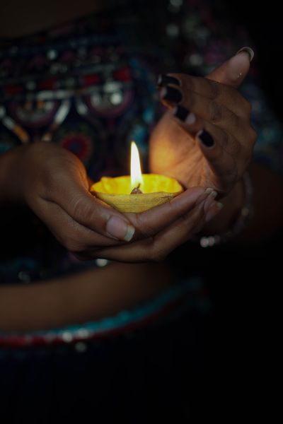 woman holding candle