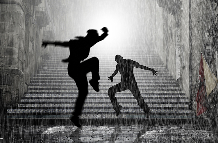 people dancing in the rain